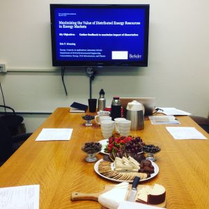 Examination table with food and presentation on screen